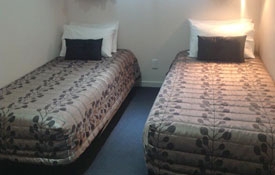 two single beds in a room